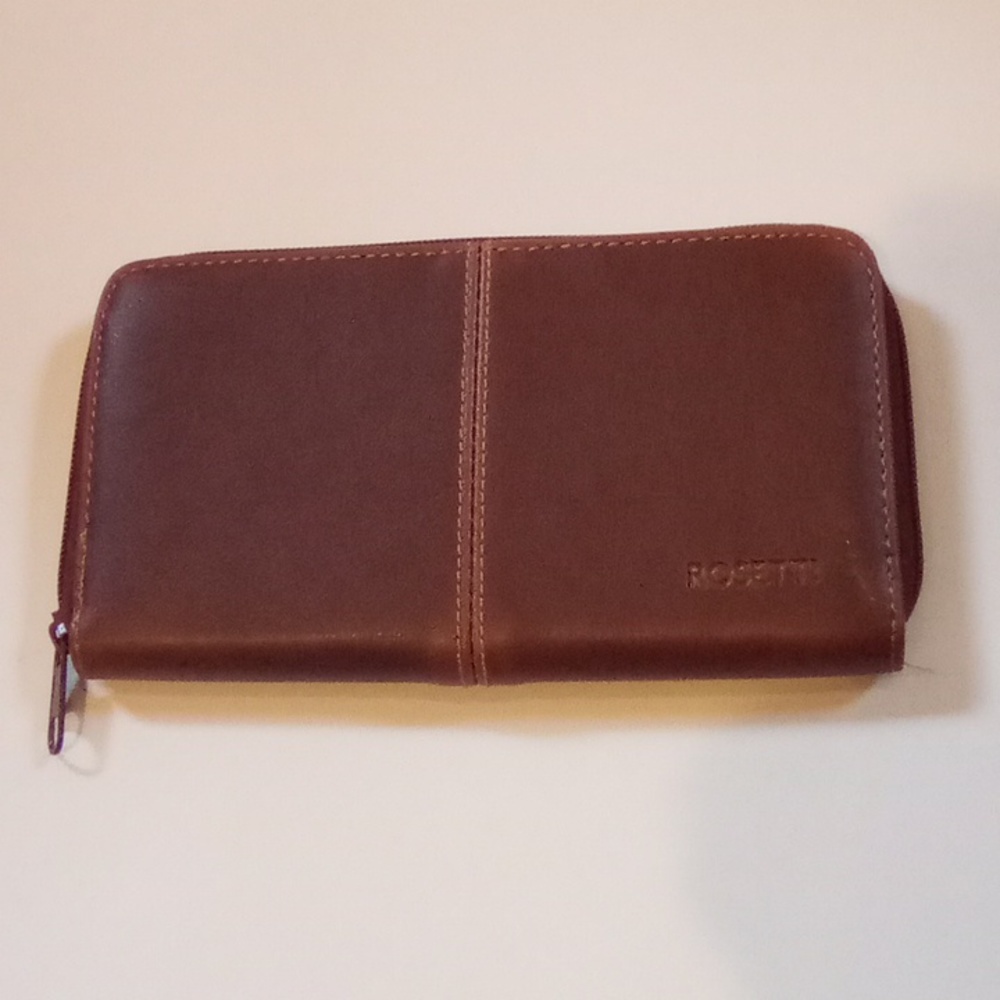Rosetti NWOT. Brown long zipper leather wallet